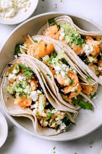 1Tasty Shrimp Tacos featuring Creamy Avocado Sauce