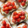 1Whipped Ricotta Roasted Tomato Toasts everydaydeliciouskitchen.com 12 768x1152 2