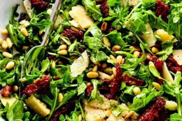 Easy Arugula Salad Recipe with Parmesan 1 Salad of Arugula featuring Sun Dried Tomatoes and Pine Nuts