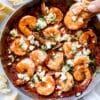 Saucy Greek Shrimp Recipe everydaydeliciouskitchen.com 055 1024x1536 1