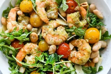 Arugula Salad with Pesto Shrimp, Parmesan and White Beans 4 Pesto Shrimp Arugula and Parmesan Salad everydaydeliciouskitchen.com 1
